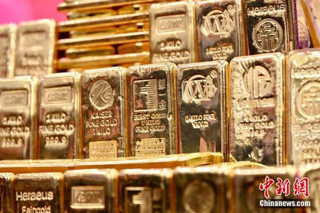 资料图：黄金金条。 中新社记者 李志华 摄