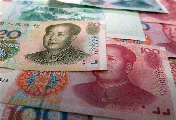1月9日人民币兑美元中间价报7.0128上升69个基点